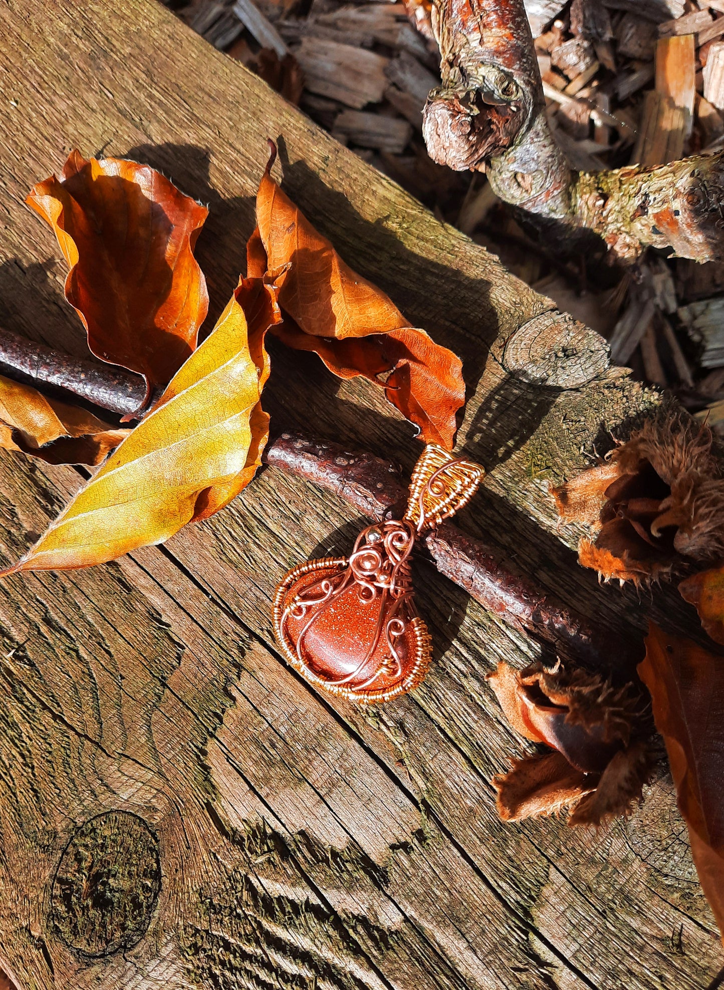 Goldstone pumpkin pendant