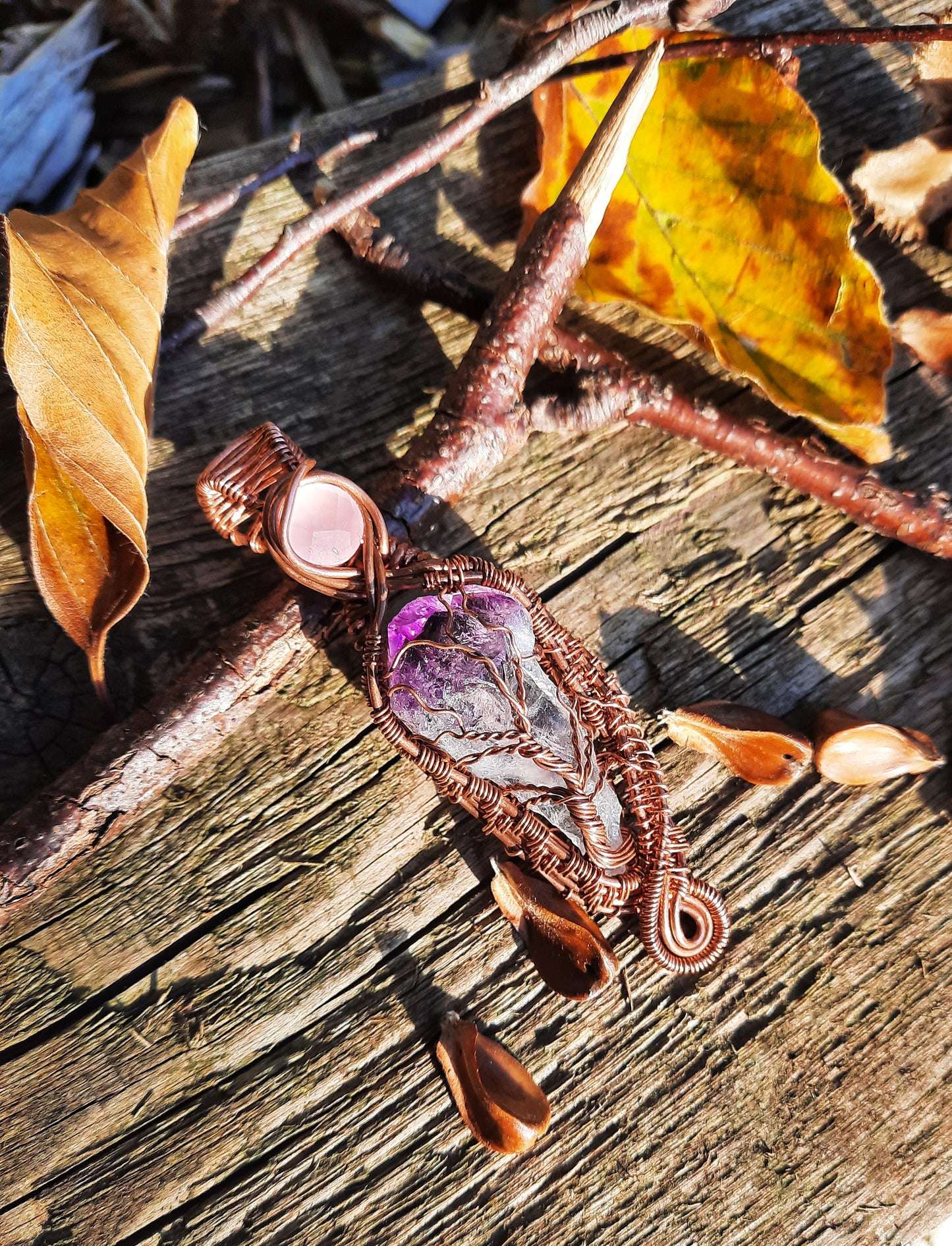 Tree of life pendant, raw amethyst point, rose cut rose quartz accent. Copper wire, weaved frame around tree with swirls.