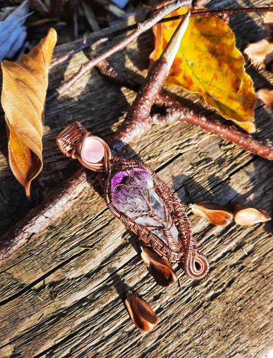 Tree of life pendant, raw amethyst point, rose cut rose quartz accent. Copper wire, weaved frame around tree with swirls.